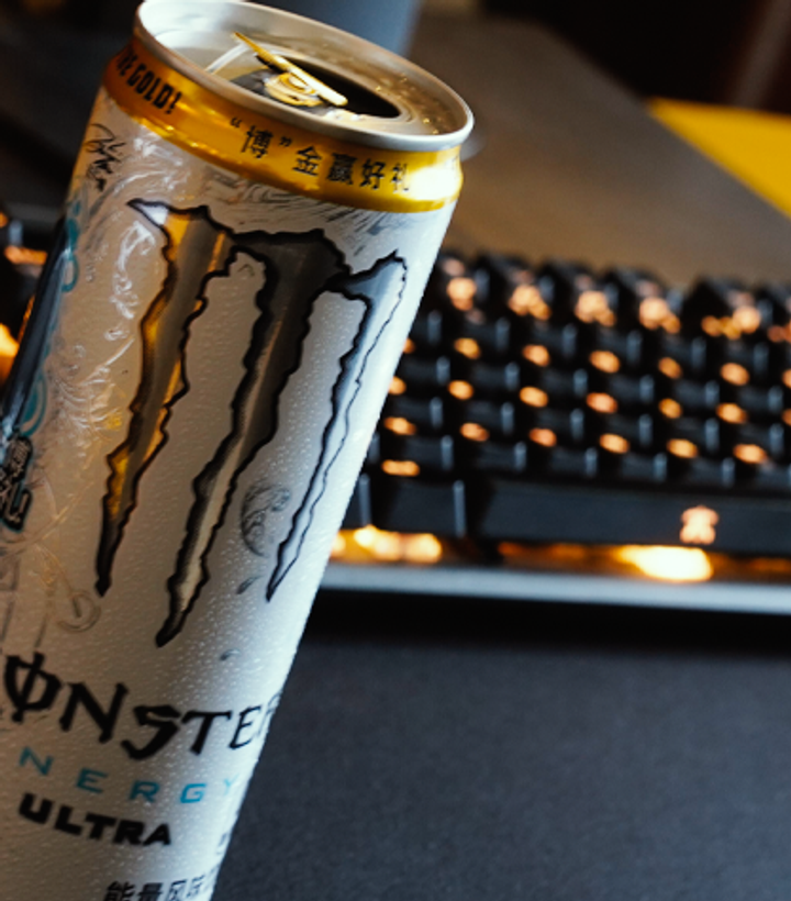 Can of monster by a Fnatic keyboard