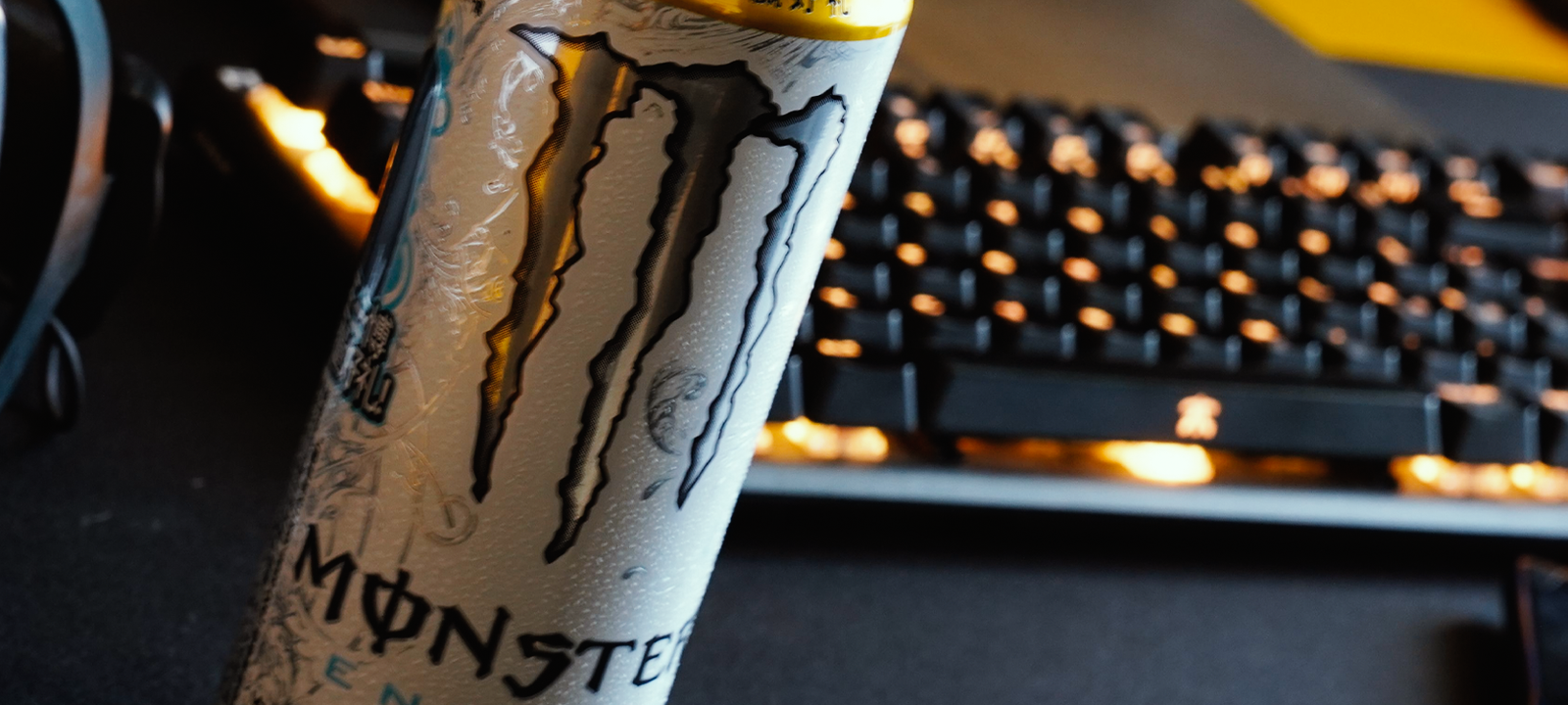 Can of monster by a Fnatic keyboard